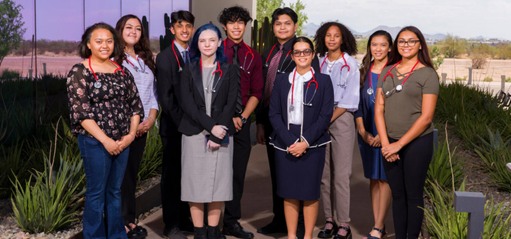 Mayo Clinic CARES 2021 graduates pose for a group photo outside at Mayo Clinic in Phoenix, Arizona.