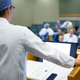 Anesthesiology faculty member gives a lecture in Rochester, Minnesota.