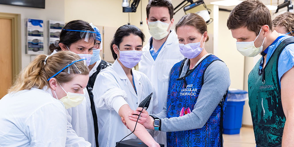 Residents scanning a bone