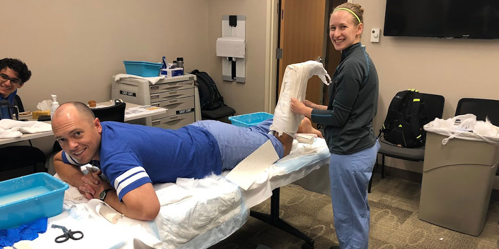 Emergency medicine residents train in a sports medicine clinic