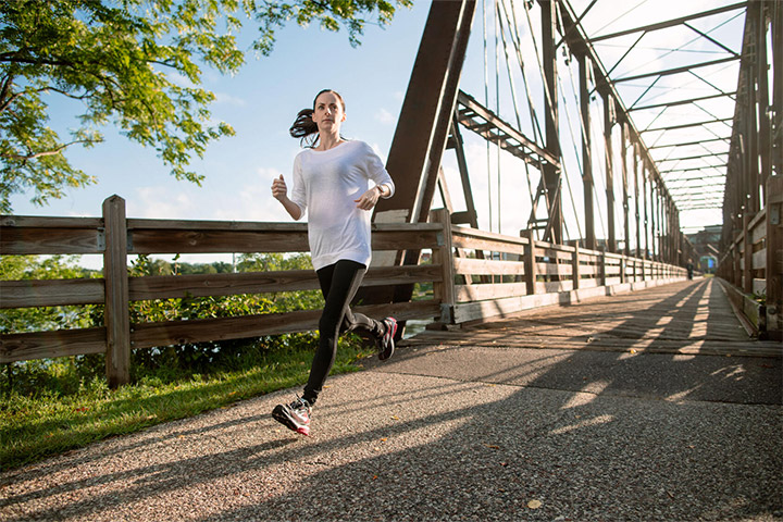 A woman runs on a bridge in Eau Claire, Wisconsin.