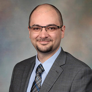 Musab Hommos, M.B.B.B.