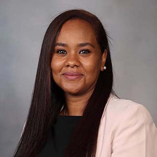 Headshot of Farah Wigdan