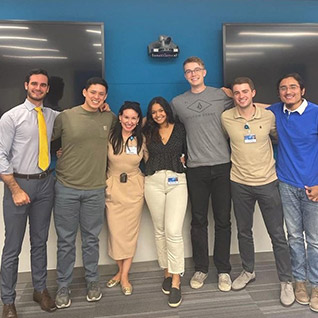 Medical students participating in the Medical Spanish selective pose together for a group photo at Mayo Clinic Alix School of Medicine.